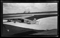 [Small Pan-Am plane on airfield]