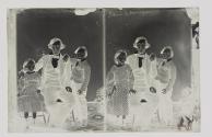 [Man and two children]