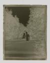 [Two women playing croquet]