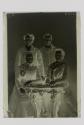 [Two men and two women]