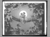 [Couple On Tree Branch]