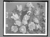 [Woman Amoung Giant Roses]