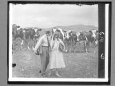 [Couple In Cow Pasture]