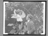 [Man, Woman In Flower Head]