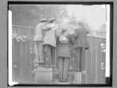 [Four Men And Fence]