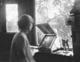 [Anne Brigman in studio]