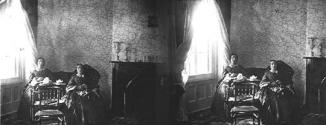 [Two women seated in room]