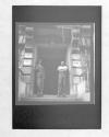 Two men in doorway of Rooming House