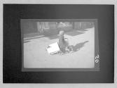 Boy on Ticycle