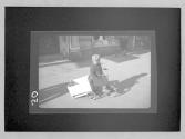 Boy on Ticycle