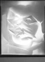 [Cut paper abstraction]