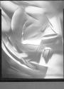 [Cut paper abstraction]