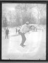 [Man ice skating]