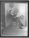 [William Jennings Bryant seated on porch]