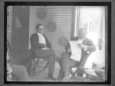 [William Jennings Bryant and another man on porch]