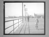 [C. Irving Fisher On Walkway]