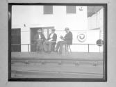 [C. Irving Fisher Sitting Aboard Ship]