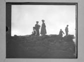 [People In Rocky Landscape]