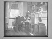 [C. Irving Fisher In Livingroom]