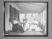 [People On Porch Exterior]