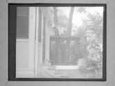 [People Sitting In Balcony Of Ann Benton's Home]