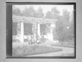 [People In Front Of Columned Architecture]
