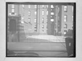 [Buildings And Steel Gate]