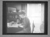 LMF At Desk In Sitting Room