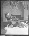 [Man in rocking chair]
