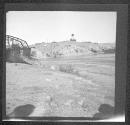 [Bridge And Silo In Desert Landscape]
