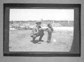 [Man and naked child]