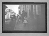 [People In Street Scene]