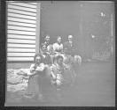 [Group Portrait And House Exterior]