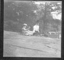 [Gertrude G. Fisher And (Clarence L. Fisher) Sitting Outdoors]