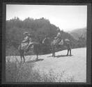 [Woman And Child On Horseback]