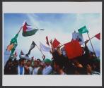 Bedouins shout anti-Israeli slogans, waving Palestinian flags and posters of Lebanese Hizbullah leader Nasrallah, during the "Land Day" protests, near the Bedouin city of Rahat