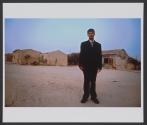 A groom stands near his house, in the unrecognized Bedouin village of Abu Ajaj