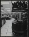 [Computer room with technicians and magnetic tape]