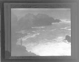 [Figure overlooking the sea]