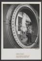 [Checking diameter of 15-feet-tall stator]