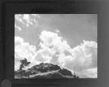 [Clouds and mountain peaks]