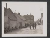 [5th Infantry division, 3rd US Army troops rest in the streets of Hassloch, Germany, after the town was captured. (m)  5th Inf Div., TUSA, Hassloch, Germany.]