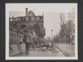 [Battle for Frankfurt!!! meeting heavy resistance in house to house fighting. Men od the 3rd US Army's 5th Infantry Division move ahead through rubble strewn streets.  5th Inf Div TUSA Frankfurt, Germany]