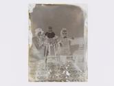 [Woman and two children]