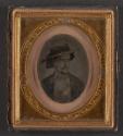 [Man wearing wide brim hat]