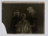 [Two women and a man]