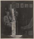 [Portrait of man seated in chair]