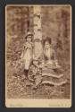 [Woman with two children]