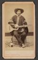 [Peruvian man with guitar]