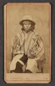 [Peruvian man in peasant clothes]